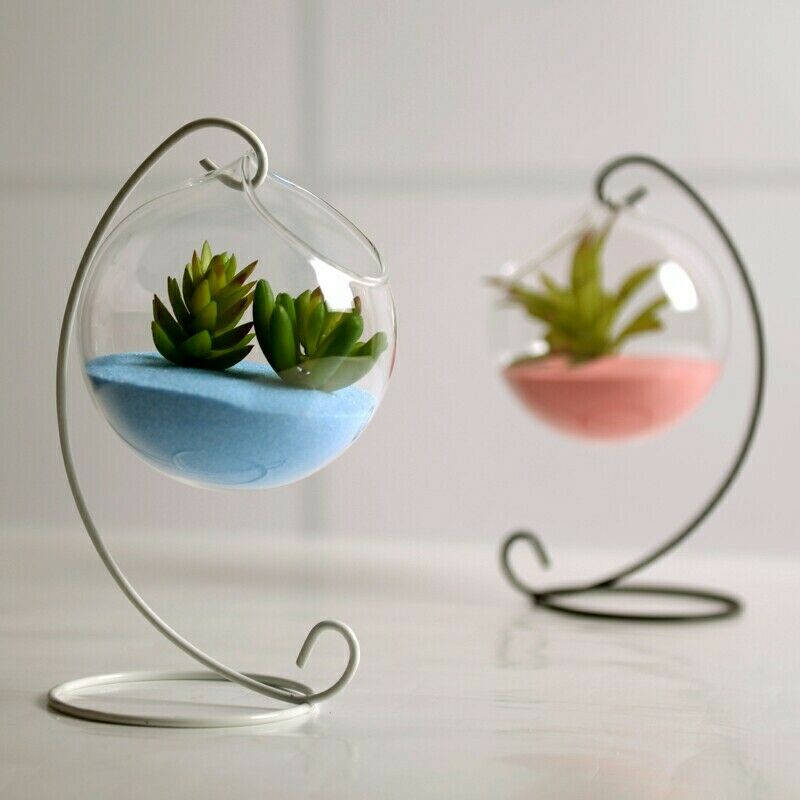 Round glass vase with metal suspension